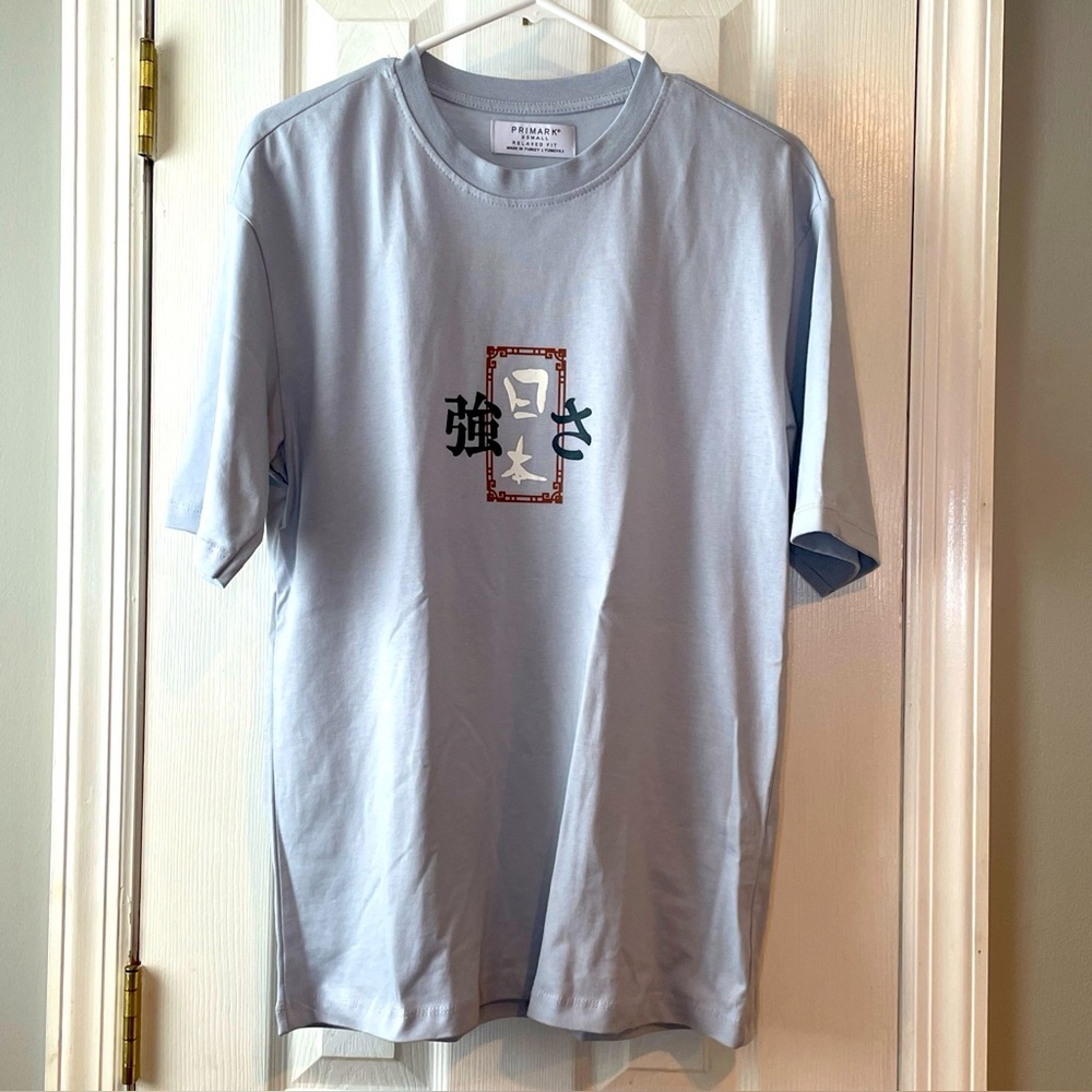 Primark Graphic T-Shirt Men’s‎ X-Small Relaxed Fit Light Blue 100% Cotton NWOT